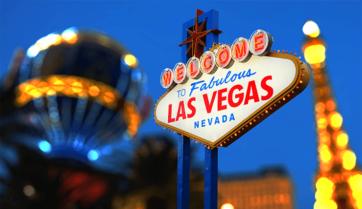 The city sign welcoming people to Las Vegas.