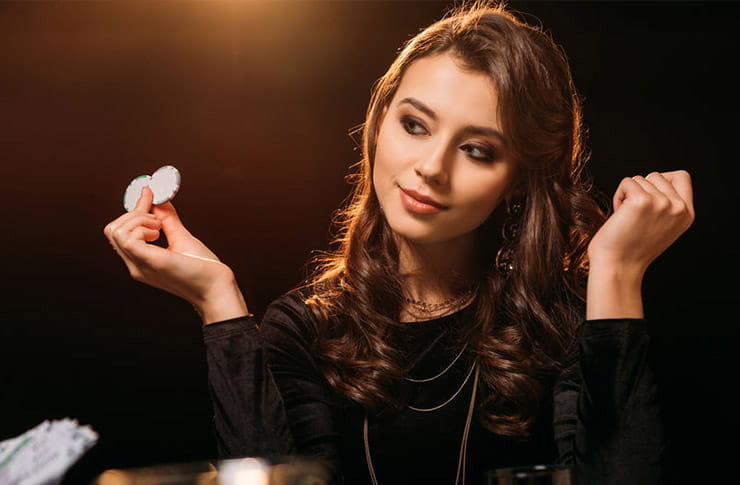 A woman playing poker.