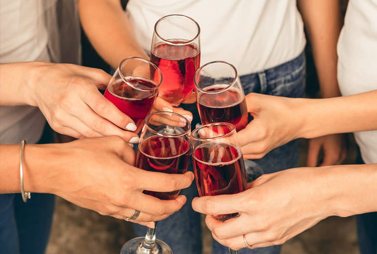 A group of friends drinking wine.